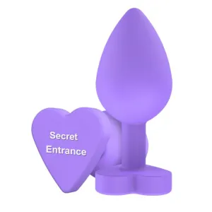 Plug anal TOYJOY Anal Play Booty Sweethearts. cu mesaj „Secret Entrance pe baza în formă de inimă. diametru 3.5 cm. mov
