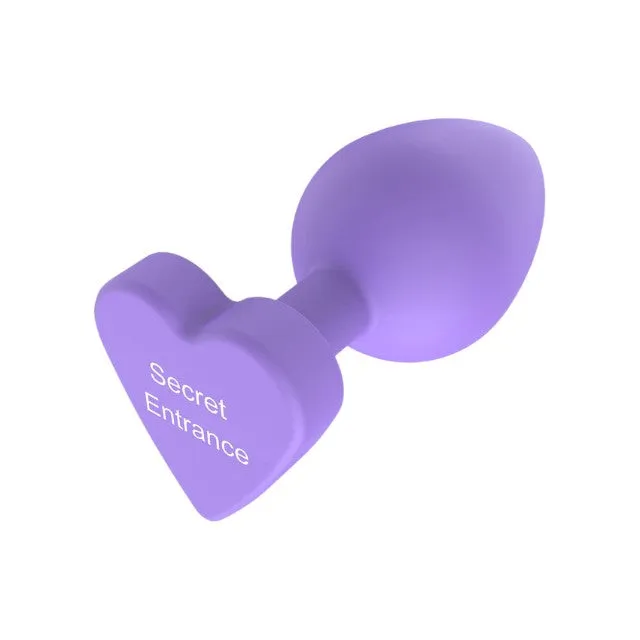 Plug anal TOYJOY Anal Play Booty Sweethearts. cu mesaj „Secret Entrance pe baza în formă de inimă. diametru 3.5 cm. mov